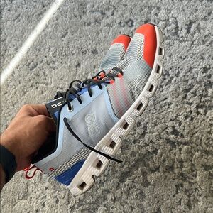 On Running Men's Blue and Red Athletic Shoes